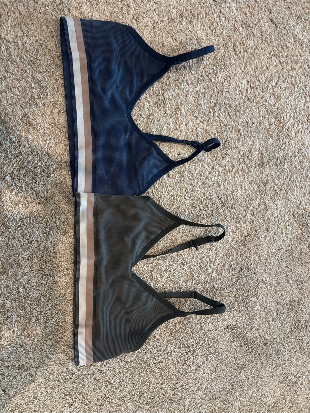 Set of Two SPANX sports bras in Navy and Olive